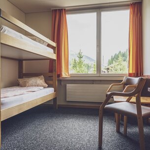 Shared room with bunk beds | © Davos Klosters Mountains