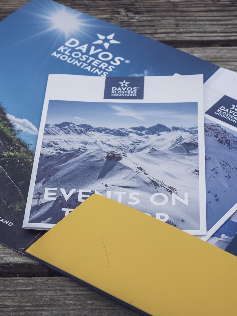 Event brochure | © Davos Klosters Mountains Event brochure packed in a branded folder from the Davos Klosters Mountains. | © Davos Klosters Mountains
