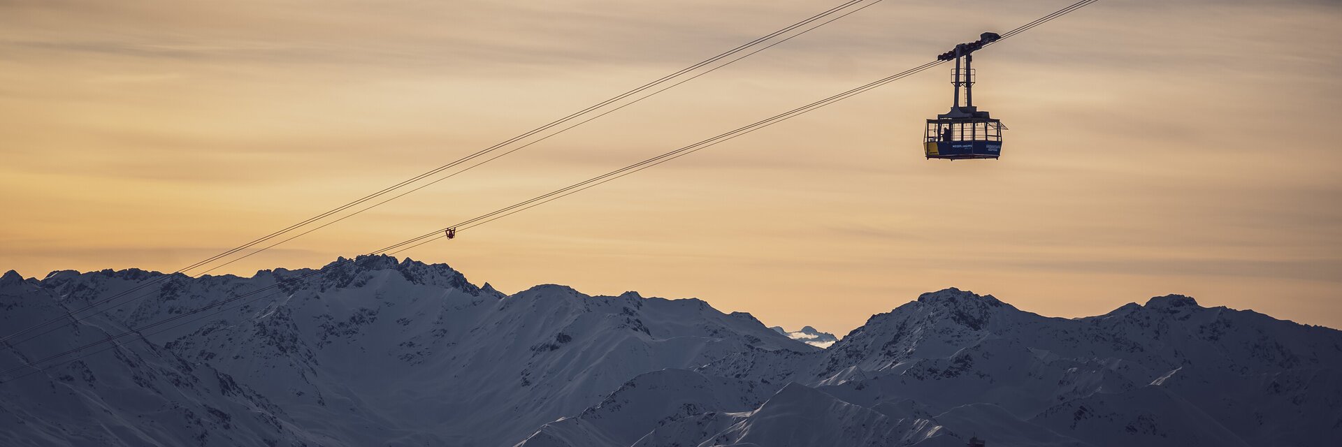 Bild von Gondel bei Sonnenuntergang  | © Davos Klosters Mountains 