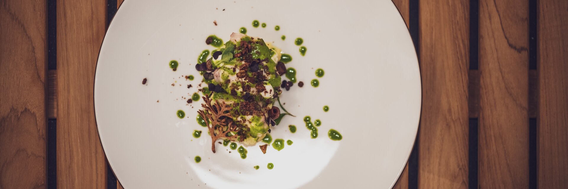 Prepared octopus salad Bistro National | © Davos Klosters Mountains Prepared plate with a delicious octopus salad, view from above. | © Davos Klosters Mountains