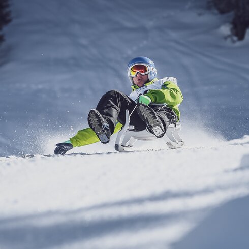 Schlittler beim Schlittelrennen auf dem Rinerhorn | © Marcel Giger