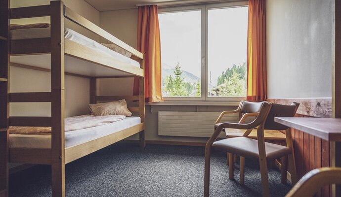 Shared room with bunk beds | © Davos Klosters Mountains