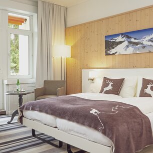Doppelzimmer mit Balkon | © Davos Klosters Mountains