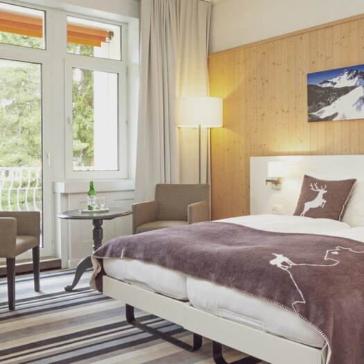 Doppelzimmer mit Balkon | © Davos Klosters Mountains
