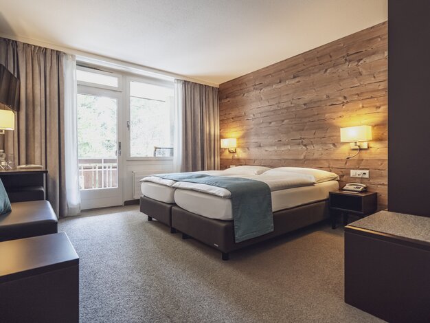 Doppelbett im Hotel Strela  | © Davos Klosters Mountains