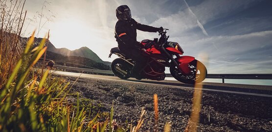 Close-Up of a fast Motorcyclist at Fluelapass Davos Klosters