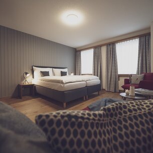 Modernes Doppelzimmer mit Charme. | © Davos Klosters Mountains 